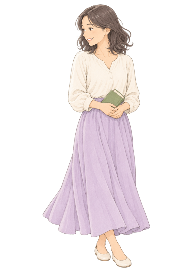 本を持ち、やさしく微笑む女性