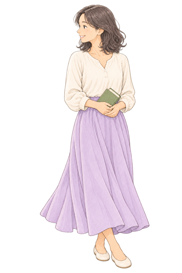 本を持ち、やさしく微笑む女性