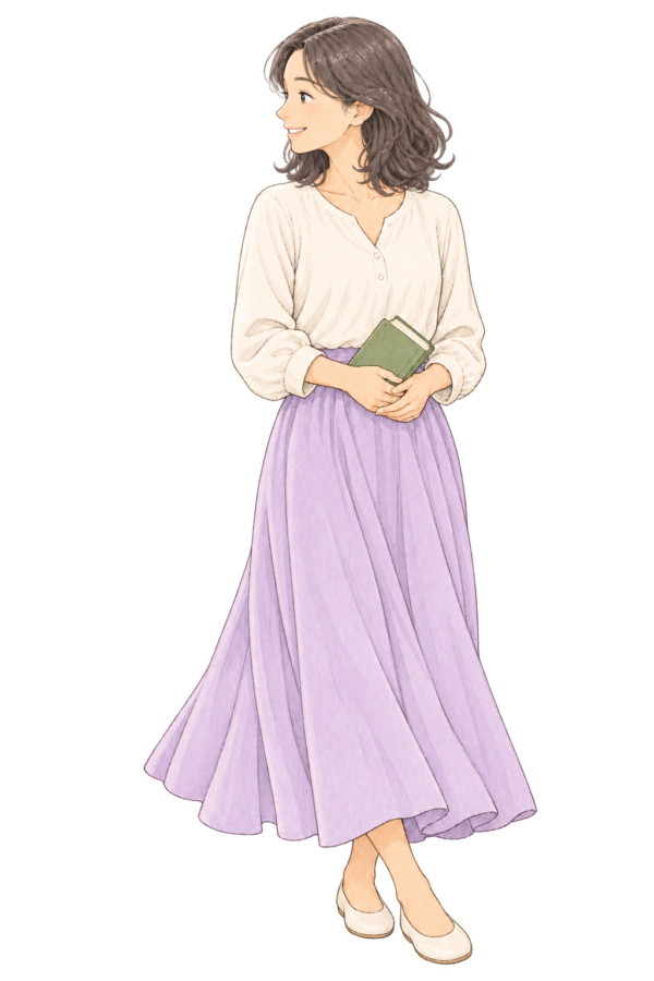 本を持ち、やさしく微笑む女性